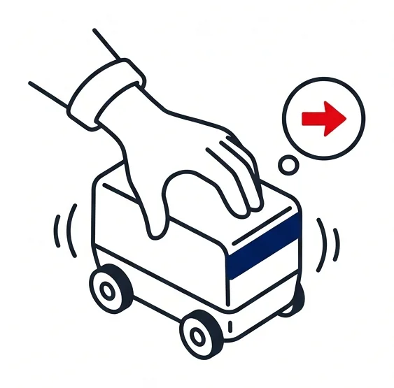 Illustration of a hand gently shaking a robot's body, with a red forward arrow appearing above it